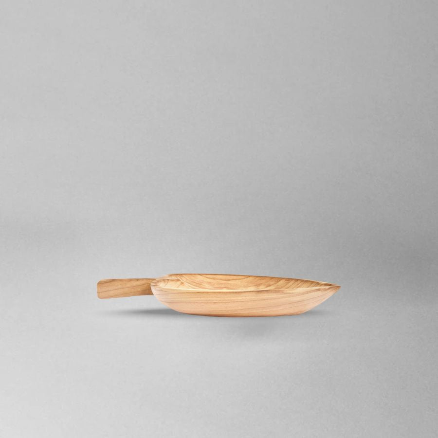 handcrafted leaf-shaped wooden tray