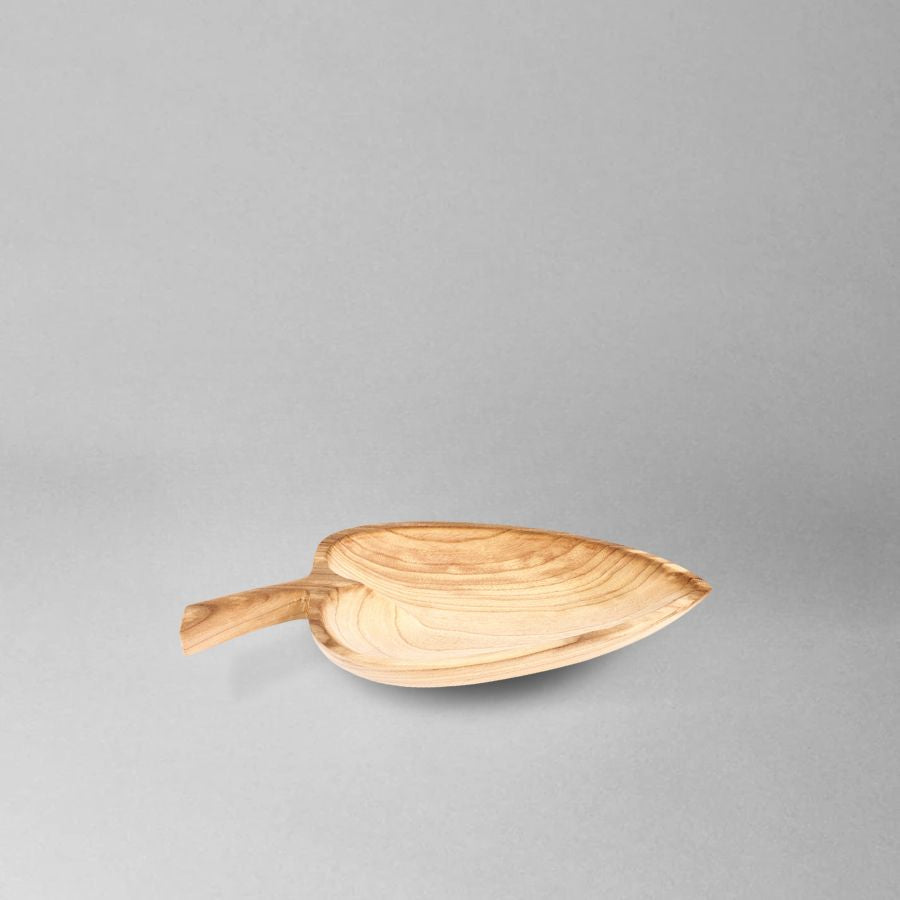 handcrafted leaf-shaped wooden tray